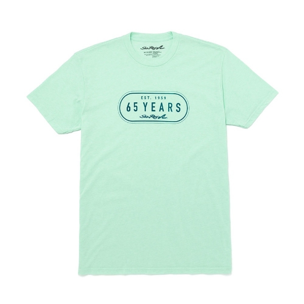 Image of a mint tee with a green 65th anniversary Sea Ray logo on the front