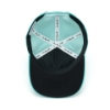 Teal baseball cap with "Sea Ray" embroidered in white on the front.