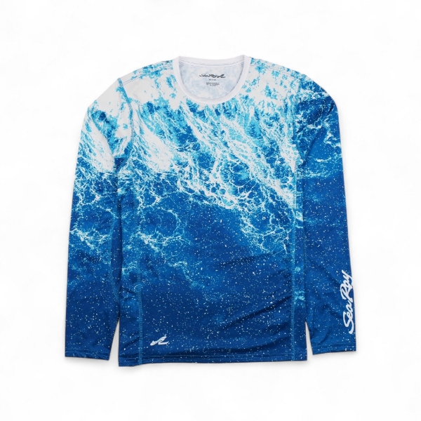 Front image of the Blue Wave Long Sleeve Performance Shirt with the Sea Ray logo visible on the right sleeve in white script, and another logo or emblem appears near the bottom left hem