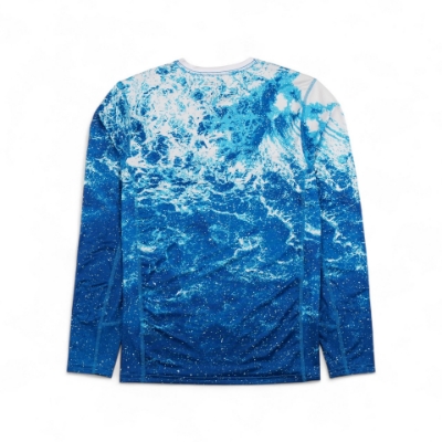 Front image of the Blue Wave Long Sleeve Performance Shirt with the Sea Ray logo visible on the right sleeve in white script, and another logo or emblem appears near the bottom left hem