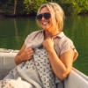 Woman with Sea Ray X Sunbrella Boat Throw