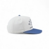 Right side view of a white Sea Ray hat with a blue bill and partial front logo embroidery visible.