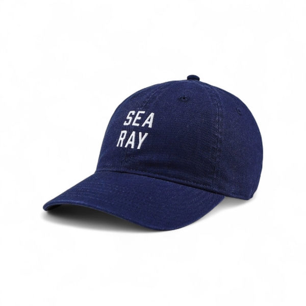 Navy blue Sea Ray hat shown at a three‑quarter left angle with white embroidered “Sea Ray” text on the front.