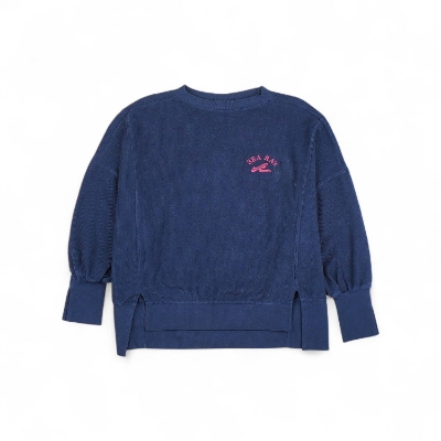 Women's Corded Pullover A dark navy blue sweatshirt with a relaxed fit, crew neckline, long sleeves with cuffed ends, and a curved hem. The Sea Ray logo is embroidered in hot pink on the left chest.