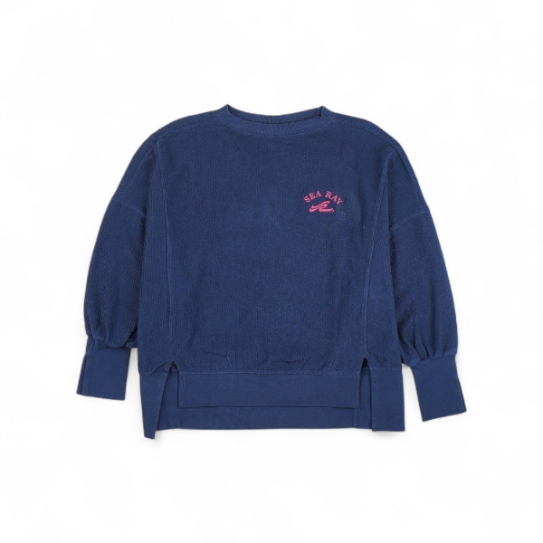 A dark navy blue sweatshirt with a relaxed fit, crew neckline, long sleeves with cuffed ends, and a curved hem. The Sea Ray logo is embroidered in hot pink on the left chest.