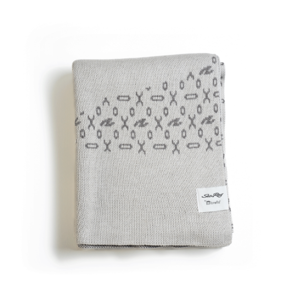 Image of folded Sunbrella X SeaRay Silhouette Knit Throw on white background