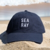 Sea Ray Coastal Hat in front of water
