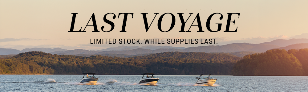 Last Voyage text above beautiful photo of the sunset with three Sea Ray boats in the water.
